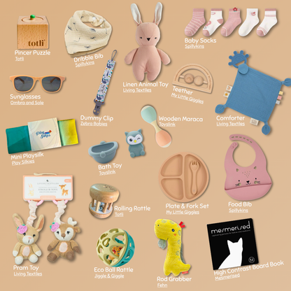 A flat-lay collage of baby sensory items available in the 6-12 month scoop order, including Pincer Puzzle from Totli, Dribble Bib from Spillykins, Linen Animal Toy from Living Textiles, baby socks from Spillykins, Sunglasses from Ombra and Sole, Dummy Clip from Zebra Babies, Wooden Maraca from Toyslink, Wooden Teether from My Little Giggles, Teething Comforter from Living Textiles, Mini play silk from Play Silkies, Bath Toy from Toyslink, Play and Fork Set from My Little Giggles.