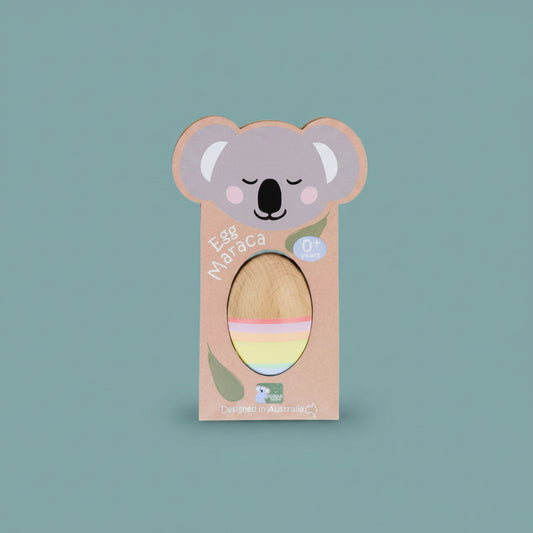 Wooden maraca with a koala design on the packaging against a white background