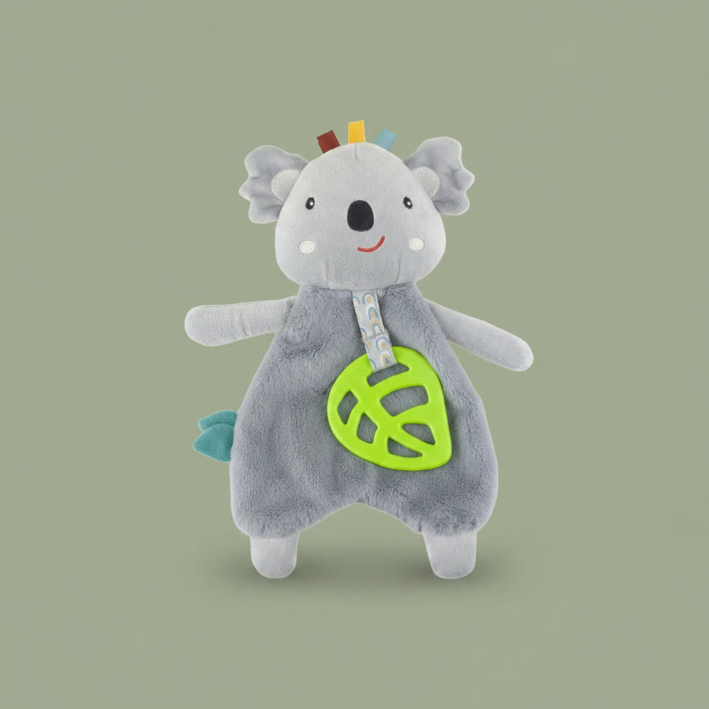 Gray plush toy koala with colorful accents on a olive-green background