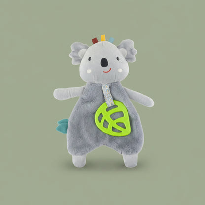 Gray plush toy koala with colorful accents on a olive-green background