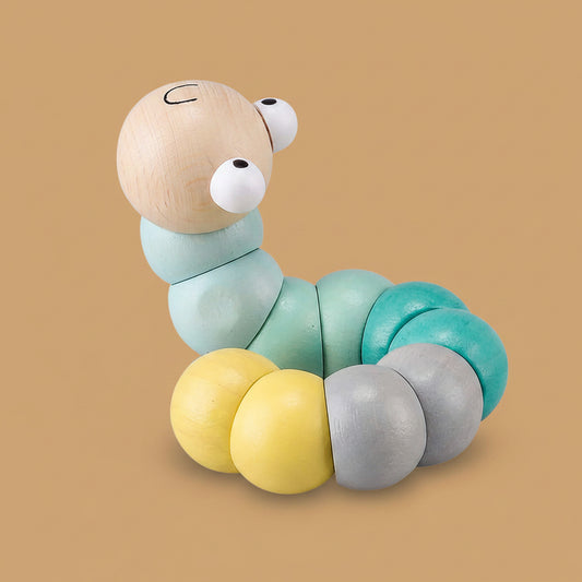 Wooden toy caterpillar with multicolored segments on a white background